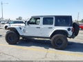 2018 Jeep Wrangler Unlimited — photo 15 of 17 | VIN 1C4HJXFG0JW165798