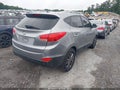 2015 Hyundai Tucson — photo 4 of 16 | VIN KM8JU3AG3FU082504