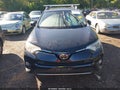 2018 Toyota RAV4 — photo 12 of 16 | VIN 2T3RFREV8JW702286