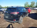 2018 Toyota RAV4 — photo 4 of 16 | VIN 2T3RFREV8JW702286