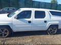 2014 Honda Ridgeline — photo 14 of 17 | VIN 5FPYK1F74EB010229