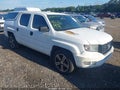 2014 Honda Ridgeline — photo 1 of 17 | VIN 5FPYK1F74EB010229