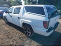 2014 Honda Ridgeline — photo 3 of 17 | VIN 5FPYK1F74EB010229