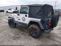 2002 Jeep Wrangler — photo 3 of 12 | VIN 1J4FA39S12P734339