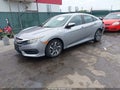 2016 Honda Civic — photo 2 of 19 | VIN 19XFC2F78GE217945