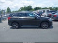 2018 BMW X1 — photo 13 of 16 | VIN WBXHU7C31J5L09036