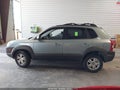2006 Hyundai Tucson — photo 13 of 15 | VIN KM8JN12D86U256623