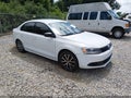 2014 Volkswagen Jetta — photo 1 of 11 | VIN 3VW2K7AJ2EM445604