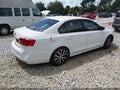 2014 Volkswagen Jetta — photo 4 of 11 | VIN 3VW2K7AJ2EM445604