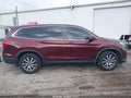 2020 Honda Pilot — photo 13 of 16 | VIN 5FNYF6H30LB053130