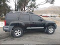 2012 Nissan Xterra — photo 13 of 16 | VIN 5N1AN0NW7CC517829