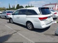 2014 Honda Odyssey — photo 3 of 19 | VIN 5FNRL5H46EB074437