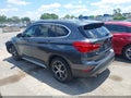 2018 BMW X1 — photo 14 of 16 | VIN WBXHT3C31J5L24583