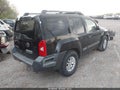 2014 Nissan Xterra — photo 4 of 17 | VIN 5N1AN0NU4EN806592