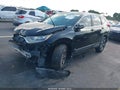 2018 Honda CR-V — photo 2 of 16 | VIN 2HKRW6H34JH211925