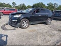 2016 Chevrolet Traverse — photo 2 of 15 | VIN 1GNKRGKDXGJ173740