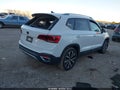 2023 Volkswagen Taos — photo 4 of 16 | VIN 3VVSX7B25PM319270