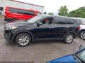 2016 Kia Sorento — photo 14 of 16 | VIN 5XYPGDA31GG044250