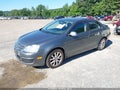 2010 Volkswagen Jetta — photo 2 of 19 | VIN 3VWRX7AJ0AM130715