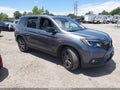 2021 Honda Passport — photo 1 of 16 | VIN 5FNYF8H56MB031308
