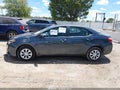 2016 Toyota Corolla — photo 14 of 16 | VIN 2T1BURHE5GC740144