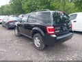 2009 Ford Escape — photo 3 of 11 | VIN 1FMCU93739KC97874