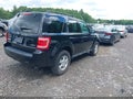 2009 Ford Escape — photo 4 of 11 | VIN 1FMCU93739KC97874