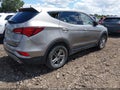 2017 Hyundai Santa Fe — photo 4 of 16 | VIN 5XYZTDLB6HG441916