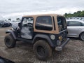 2005 Jeep Wrangler — photo 14 of 16 | VIN 1J4FA69S45P301619