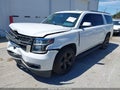 2018 Chevrolet Suburban — photo 2 of 16 | VIN 1GNSKHKC9JR263522