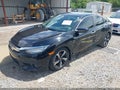 2016 Honda Civic — photo 2 of 21 | VIN 19XFC1F98GE000858