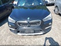 2017 BMW X1 — photo 12 of 16 | VIN WBXHT3C32H5F75500