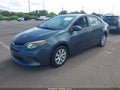 2015 Toyota Corolla — photo 2 of 16 | VIN 5YFBURHEXFP198327