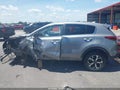2022 Kia Sportage — photo 13 of 15 | VIN KNDPMCAC1N7001010