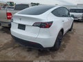 2024 Tesla Model Y — photo 4 of 20 | VIN 7SAYGDEE1RA259752