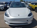 2023 Tesla Model Y — photo 6 of 18 | VIN 7SAYGAEE6PF773613