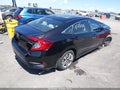 2018 Honda Civic — photo 4 of 18 | VIN 19XFC2F52JE020355