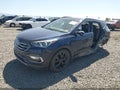 2018 Hyundai Santa Fe — photo 2 of 17 | VIN 5XYZW4LA5JG524189