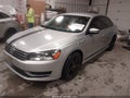 2014 Volkswagen Passat — photo 2 of 10 | VIN 1VWAP7A3XEC006599