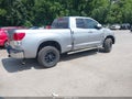 2011 Toyota Tundra — photo 4 of 18 | VIN 5TFUM5F11BX025258