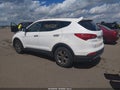 2014 Hyundai Santa Fe — photo 3 of 16 | VIN 5XYZT3LB2EG131963
