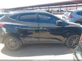 2014 Hyundai Tucson — photo 13 of 16 | VIN KM8JU3AG2EU857552