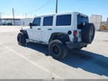 2013 Jeep Wrangler Unlimited — photo 3 of 16 | VIN 1C4HJWEGXDL550559