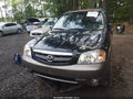 2004 Mazda Tribute — photo 6 of 11 | VIN 4F2CZ94124KM25479