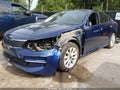2016 Kia Optima — photo 2 of 15 | VIN 5XXGU4L34GG095333