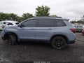 2025 Honda Passport — photo 14 of 16 | VIN 5FNYF8H89SB015899