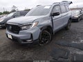 2025 Honda Passport — photo 6 of 16 | VIN 5FNYF8H89SB015899