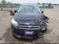 2014 Ford Focus — photo 11 of 16 | VIN 1FADP3N22EL449796