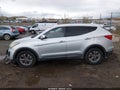 2015 Hyundai Santa Fe — photo 14 of 16 | VIN 5XYZTDLB6FG301829
