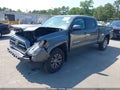 2017 Toyota Tacoma — photo 2 of 16 | VIN 3TMDZ5BN3HM023424